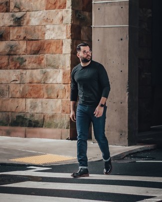 Black Long Sleeve T-Shirt Outfits For Men: A black long sleeve t-shirt and navy jeans are a good go-to ensemble to keep in your menswear arsenal. You can get a bit experimental when it comes to footwear and add black leather casual boots to the equation.