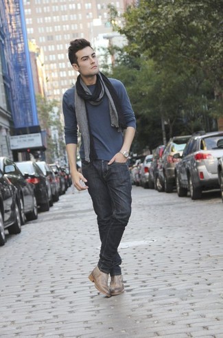 Tan Leather Chelsea Boots Outfits For Men: This pairing of a charcoal long sleeve t-shirt and black jeans is indisputable proof that a simple off-duty getup doesn't have to be boring. For maximum fashion effect, introduce a pair of tan leather chelsea boots to the mix.