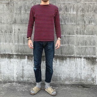 Navy Horizontal Striped Long Sleeve T-Shirt Outfits For Men: Marry a navy horizontal striped long sleeve t-shirt with navy jeans for a casual look with an edgy spin. A trendy pair of beige suede sandals is an easy way to add a confident kick to the outfit.