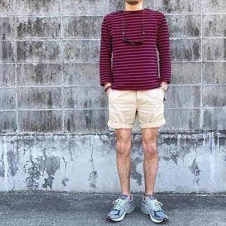 Beige Shorts Outfits For Men: This pairing of a navy horizontal striped long sleeve t-shirt and beige shorts makes for the ultimate relaxed casual style for any modern man. Add light blue athletic shoes to your getup to effortlessly kick up the appeal of this getup.