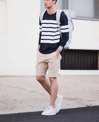 White Canvas Backpack Outfits For Men: A navy and white horizontal striped long sleeve t-shirt and a white canvas backpack are a good combination worth having in your current casual repertoire. Don't know how to finish off this look? Rock white athletic shoes to ramp it up.