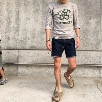 Tan Suede Sandals Outfits For Men: This casually cool getup is really pared down: a grey print long sleeve t-shirt and navy denim shorts. Give a playful vibe to your look with tan suede sandals.