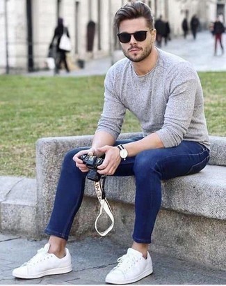 Blue Watch Outfits For Men: No matter where you go over the course of the day, you'll be stylishly ready in this laid-back combination of a grey long sleeve t-shirt and a blue watch. If you want to break out of the mold a little, introduce white canvas low top sneakers to the mix.