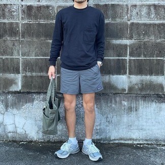 Grey Athletic Shoes Outfits For Men: If you like practical ensembles, pair a navy long sleeve t-shirt with grey sports shorts. Grey athletic shoes integrate seamlessly within a myriad of outfits.