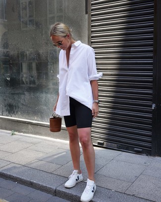 Women's Brown Leather Bucket Bag, White Leather Low Top Sneakers, Black Bike Shorts, White Dress Shirt