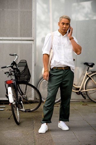 Dark Green Chinos with White Leather Low Top Sneakers Outfits: 
