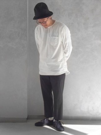 Men's Black Bucket Hat, Navy Canvas Low Top Sneakers, Charcoal Chinos, White Long Sleeve T-Shirt