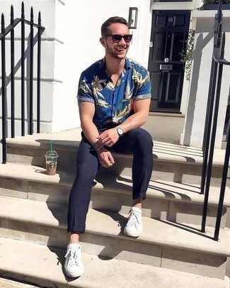 Men's Dark Brown Sunglasses, White Canvas Low Top Sneakers, Navy Chinos, Navy Floral Short Sleeve Shirt