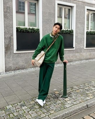 Men's Beige Canvas Messenger Bag, White Canvas Low Top Sneakers, Dark Green Chinos, Dark Green Sweatshirt