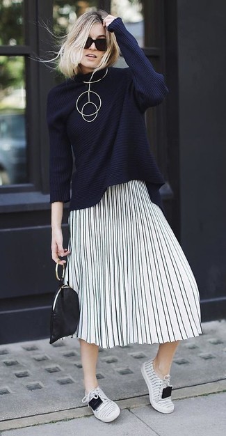 Women's Black Leather Clutch, White Vertical Striped Low Top Sneakers, White and Black Vertical Striped Midi Skirt, Navy Oversized Sweater
