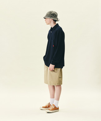 Men's Grey Bucket Hat, Orange Canvas Low Top Sneakers, Tan Shorts, Navy Polo Neck Sweater