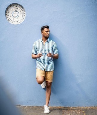 Men's Blue Sunglasses, White Canvas Low Top Sneakers, Tan Shorts, White and Navy Vertical Striped Short Sleeve Shirt