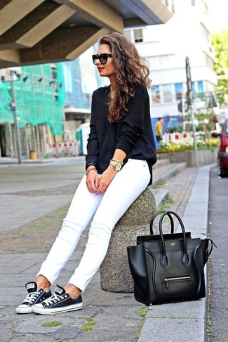 Women's Black Leather Tote Bag, Black and White Low Top Sneakers, White Skinny Jeans, Black Long Sleeve Blouse