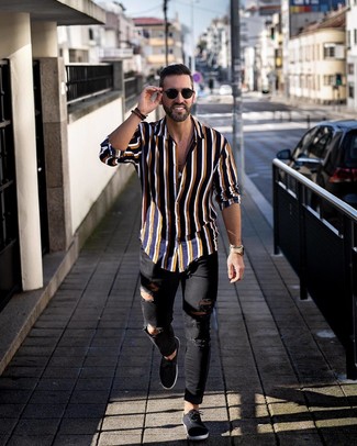 Men's Black Sunglasses, Black Canvas Low Top Sneakers, Black Ripped Skinny Jeans, Navy Vertical Striped Long Sleeve Shirt