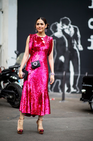 Black Quilted Leather Clutch Outfits: This pairing of a hot pink sequin midi dress and a black quilted leather clutch is indisputable proof that a pared down casual ensemble doesn't have to be boring. If you want to instantly perk up this outfit with one single piece, add a pair of tan satin pumps to this getup.