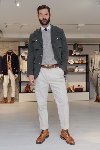 White Corduroy Chinos Outfits: This outfit with a charcoal military jacket and white corduroy chinos isn't hard to pull together and is easy to change. This look is rounded off wonderfully with tobacco leather casual boots.