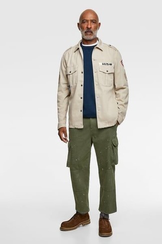 Men's Beige Military Jacket, Navy Crew-neck T-shirt, Olive Cargo Pants, Brown Suede Desert Boots