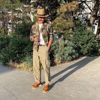 Tan Straw Hat Outfits For Men: Rushed mornings require a straightforward yet casually stylish ensemble, such as an olive camouflage military jacket and a tan straw hat. Amp up your whole outfit with tobacco leather loafers.