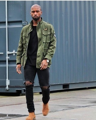 Tobacco Suede Chelsea Boots Outfits For Men: An olive military jacket and black ripped jeans make for the ultimate casual style for any modern gent. A trendy pair of tobacco suede chelsea boots is an easy way to inject an added dose of elegance into your outfit.