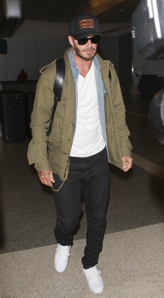 David Beckham wearing Olive Military Jacket, Light Blue Denim Shirt, White Crew-neck T-shirt, Black Jeans