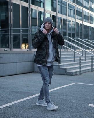 Grey Hoodie Outfits For Men: For an outfit that's extremely easy but can be flaunted in a ton of different ways, opt for a grey hoodie and grey ripped skinny jeans. Ramp up this whole outfit by sporting grey suede low top sneakers.