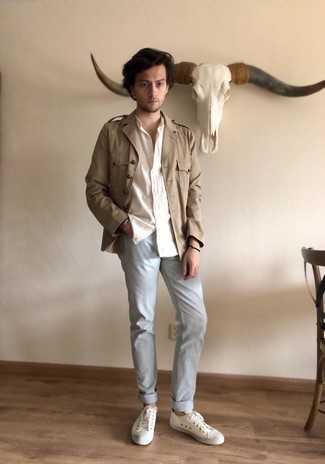 Khaki Military Jacket Outfits For Men: Marry a khaki military jacket with light blue jeans to achieve a day-to-day ensemble that's full of style and character. For times when this ensemble appears too polished, play it down by finishing with a pair of white canvas low top sneakers.