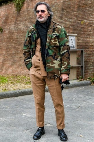 Olive Camouflage Military Jacket Outfits For Men: This sophisticated combination of an olive camouflage military jacket and a tan suit will allow you to showcase your styling skills. All you need now is a great pair of black leather derby shoes to complete your outfit.