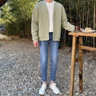 Blue Ripped Jeans Outfits For Men: This relaxed combo of a mint cardigan and blue ripped jeans is a lifesaver when you need to look cool but have zero time. Complete your ensemble with white canvas low top sneakers to tie the whole outfit together.