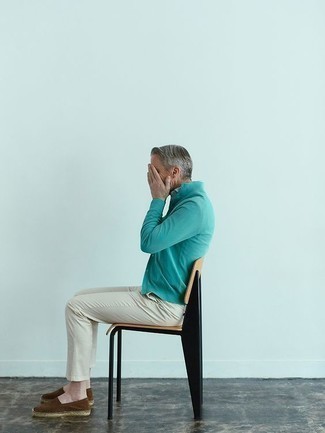 1200+ Outfits For Men After 50: This laid-back combo of a mint cardigan and beige chinos can only be described as ridiculously sharp. Add a pair of dark brown suede espadrilles to the equation and the whole outfit will come together. So if you're looking for outfit inspiration for dressing after 50, this pairing is a good example.