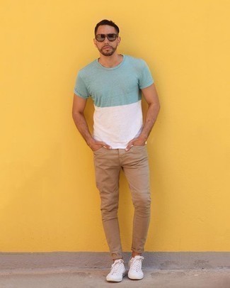 White Sneakers with Beige Jeans Casual Summer Outfits For Men: For a cool and casual look, try teaming a mint crew-neck t-shirt with beige jeans — these pieces fit perfectly well together. Our favorite of an infinite number of ways to complement this ensemble is white sneakers. Needless to say, it's easier to work through a hot weather day in a easy and breezy combo like this one.