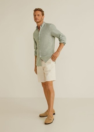 Mint Long Sleeve Shirt Outfits For Men: This off-duty pairing of a mint long sleeve shirt and white shorts is a foolproof option when you need to look stylish in a flash. Rounding off with tan suede loafers is a surefire way to introduce a little zing to this look.