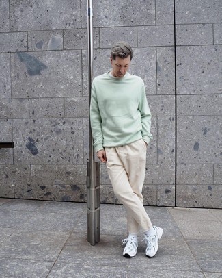 Silver Athletic Shoes Outfits For Men: If you don't like trying too hard combos, try pairing a mint sweatshirt with beige jeans. Feeling adventerous today? Switch things up by sporting silver athletic shoes.
