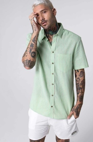 White and Green Vertical Striped Short Sleeve Shirt Outfits For Men: Putting together a white and green vertical striped short sleeve shirt with white shorts is an on-point choice for a laid-back ensemble.