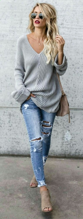 Women's Brown Suede Crossbody Bag, Beige Suede Mules, Light Blue Ripped Skinny Jeans, Grey Oversized Sweater