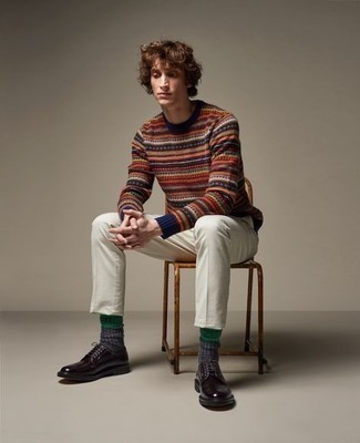 Multi colored Fair Isle Crew-neck Sweater Outfits For Men: This pairing of a multi colored fair isle crew-neck sweater and white chinos is extremely easy to put together and so comfortable to wear a variation of as well! And if you wish to immediately bump up this getup with one item, add a pair of dark purple leather derby shoes to the mix.