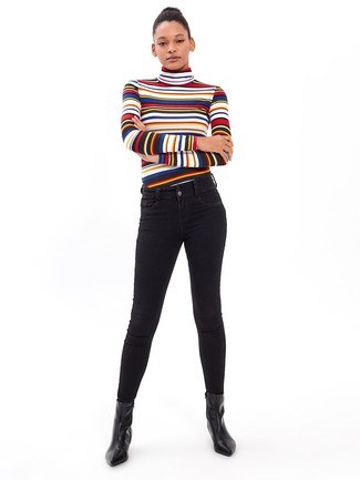 500+ Smart Casual Outfits For Women: For a stylish outfit without the need to sacrifice on functionality, we like this pairing of a multi colored horizontal striped fleece turtleneck and black skinny jeans. Add a hint of class to your outfit by finishing with black leather ankle boots.