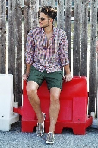 Dark Green Shorts Outfits For Men: Go for a straightforward yet casually stylish getup by wearing a multi colored check long sleeve shirt and dark green shorts. A pair of multi colored print canvas slip-on sneakers is a good option to complete this ensemble.