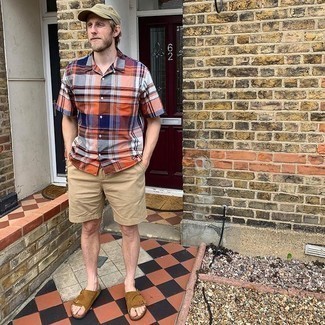 Shorts Outfits For Men: This off-duty combination of a multi colored plaid short sleeve shirt and shorts is extremely easy to pull together without a second thought, helping you look awesome and prepared for anything without spending too much time going through your wardrobe. When this look is too much, tone it down by rounding off with a pair of brown suede sandals.