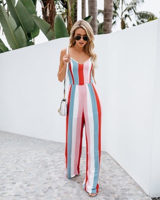 500+ Casual Hot Weather Outfits For Women: Opt for a multi colored vertical striped jumpsuit and you'll be prepared for wherever this day takes you.