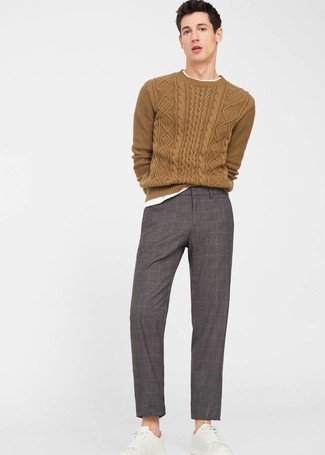 Grey Check Dress Pants Outfits For Men: This combination of a mustard cable sweater and grey check dress pants embodies masculine elegance and refined comfort. Throw white leather low top sneakers into the mix to have some fun with things.