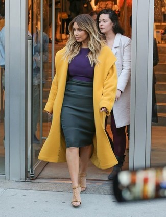 Kim Kardashian wearing Mustard Coat, Violet Long Sleeve T-shirt, Black Pencil Skirt, Tan Leather Heeled Sandals