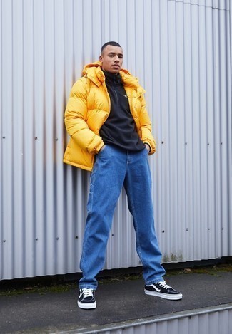 Men's Mustard Puffer Jacket, Black Zip Neck Sweater, Blue Jeans, Black and White Canvas Low Top Sneakers