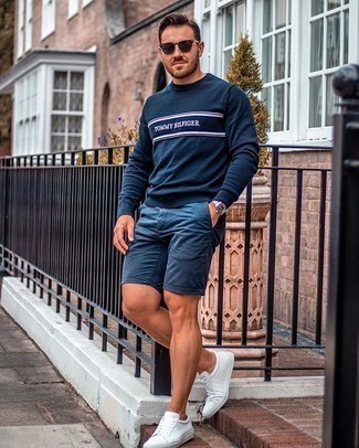 Blue Print Crew-neck Sweater Outfits For Men: If you're scouting for a laid-back yet sharp getup, go for a blue print crew-neck sweater and navy shorts. White canvas low top sneakers are a stylish accompaniment to your look.