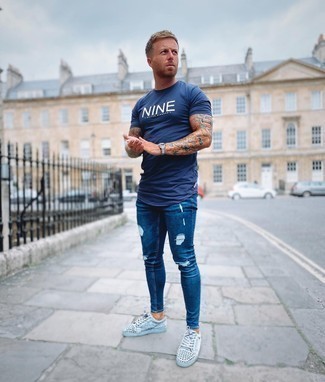 Men's Navy and White Print Crew-neck T-shirt, Navy Ripped Skinny Jeans, Light Blue Suede Low Top Sneakers, Silver Watch