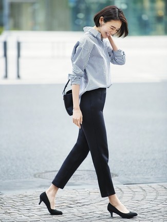 Blue Vertical Striped Dress Shirt Outfits For Women: Try teaming a blue vertical striped dress shirt with black skinny pants to assemble an incredibly chic and modern-looking outfit. Let your outfit coordination chops really shine by finishing this look with a pair of black suede pumps.