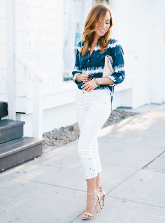 White Capri Pants Outfits: This combination of a navy and white tie-dye dress shirt and white capri pants provides comfort and practicality and helps you keep it simple yet trendy. The whole look comes together if you complement this look with a pair of beige leather heeled sandals.