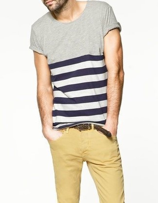 Navy and Red Horizontal Striped Crew-neck T-shirt Outfits For Men: This pairing of a navy and red horizontal striped crew-neck t-shirt and khaki chinos is very easy to replicate and so comfortable to wear all day long as well!