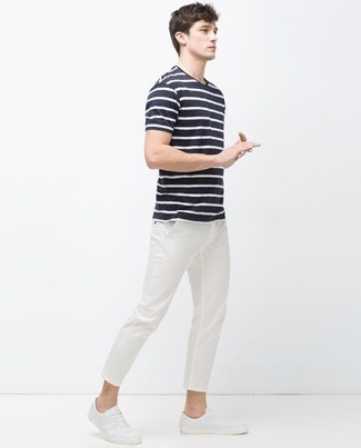 Navy Horizontal Striped Crew-neck T-shirt Outfits For Men: Why not make a navy horizontal striped crew-neck t-shirt and white chinos your outfit choice? As well as very functional, both of these items look cool when teamed together. White canvas low top sneakers are a smart pick to complete this outfit.