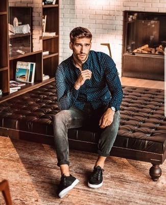 Navy and White Polka Dot Long Sleeve Shirt Outfits For Men: A navy and white polka dot long sleeve shirt and grey jeans are the ideal way to inject understated dapperness into your current off-duty lineup. Black canvas low top sneakers are a great idea to complement this look.