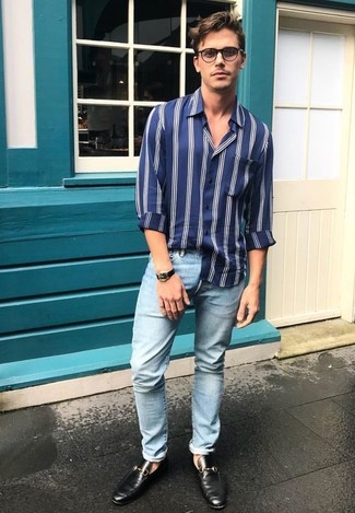Navy Vertical Striped Long Sleeve Shirt Outfits For Men: A navy vertical striped long sleeve shirt and light blue skinny jeans make for the perfect foundation for a casually dapper look. To bring a little flair to this getup, complement your ensemble with black leather loafers.